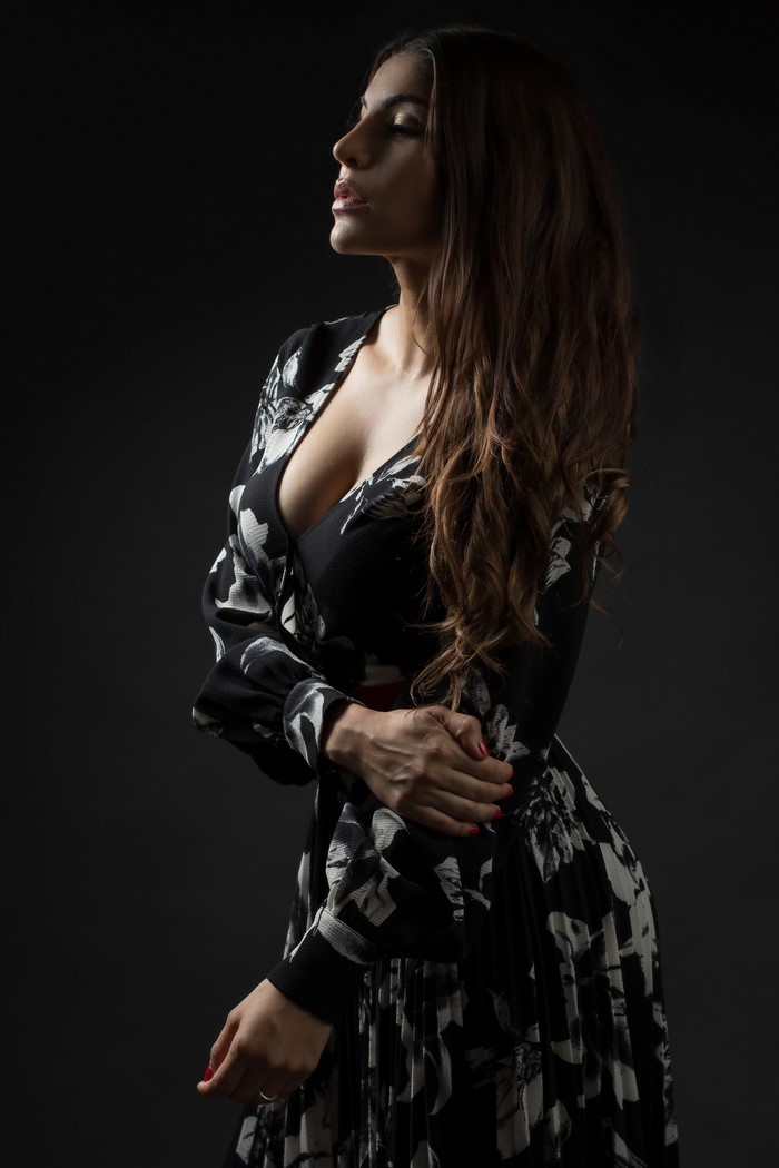 Priscila in a floral dress