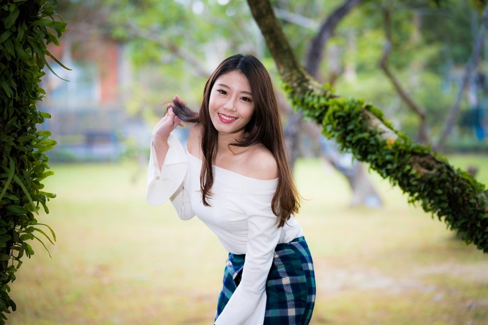 4K Portrait of Smiling Asian Woman in Outdoor Pose