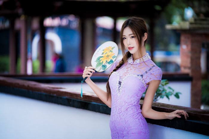 4K Portrait of Asian Woman with Hand Fan