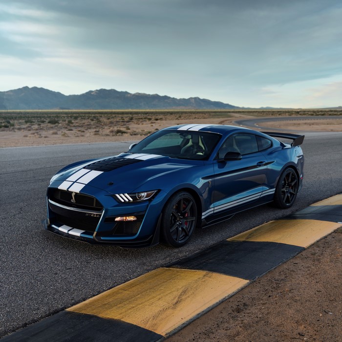 Blue Ford Mustang Shelby GT500 on a Racetrack