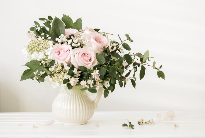 Pink Roses Bouquet in a White Vase