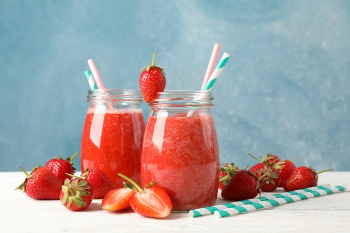 Strawberry Smoothie in Jars with Strawberries