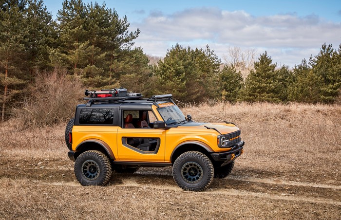 Yellow Ford Bronco 2-Door SUV with Roof Rack