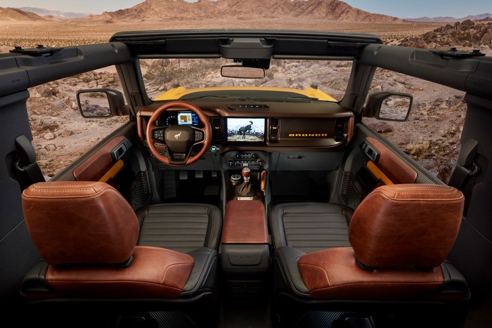 Interior of a Ford Bronco SUV in a desert landscape