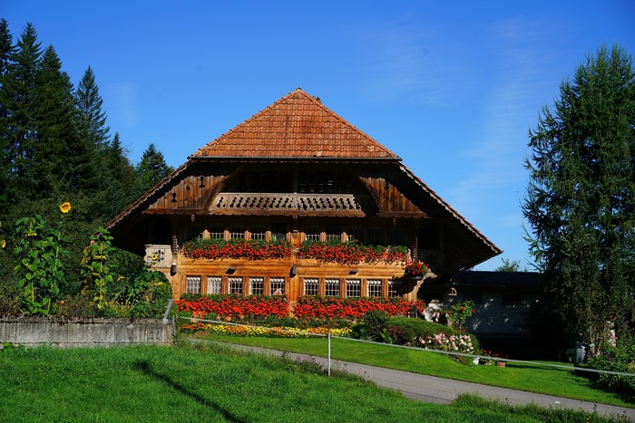 Wooden house in Switzerland with flowers