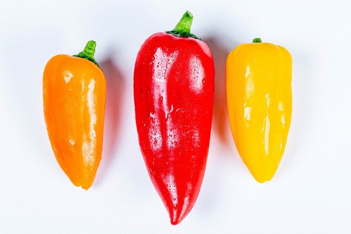 Three Bell Peppers on White Background