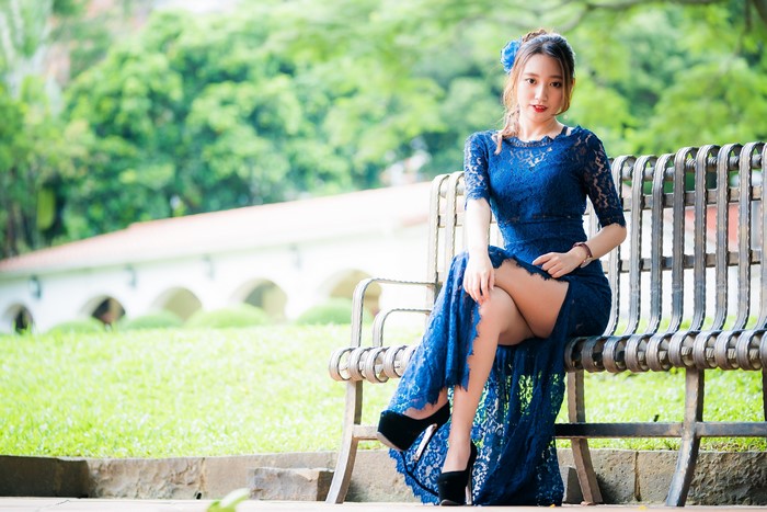 4K Asian Woman Sitting on Bench in Blue Dress