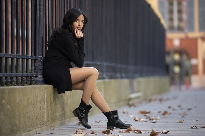 4K Brunette Asian Girl Sitting Wearing Boots