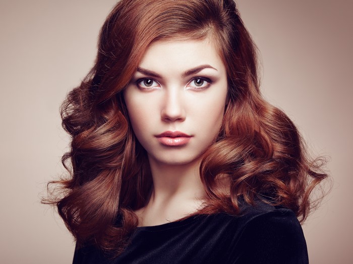 Brown haired woman with wavy hair