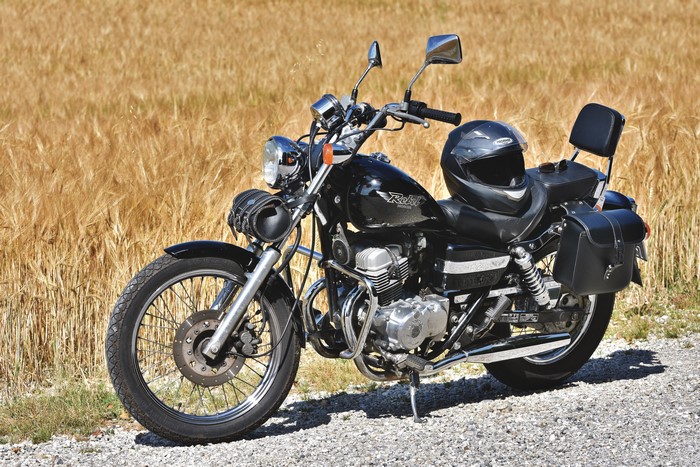 Honda Rebel 250 motorcycle with helmet