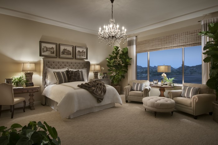 Bedroom with Chandelier and Window View