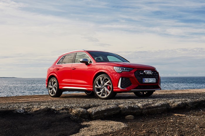 Red Audi RS Q3 Crossover parked by the sea
