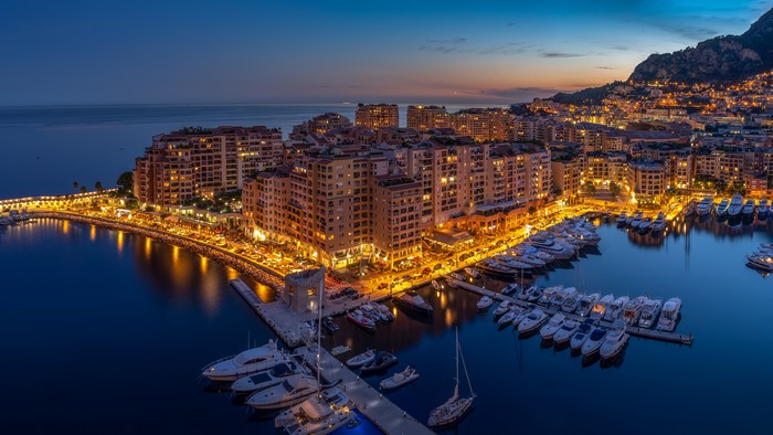 Monaco Marina at Dusk with City Lights