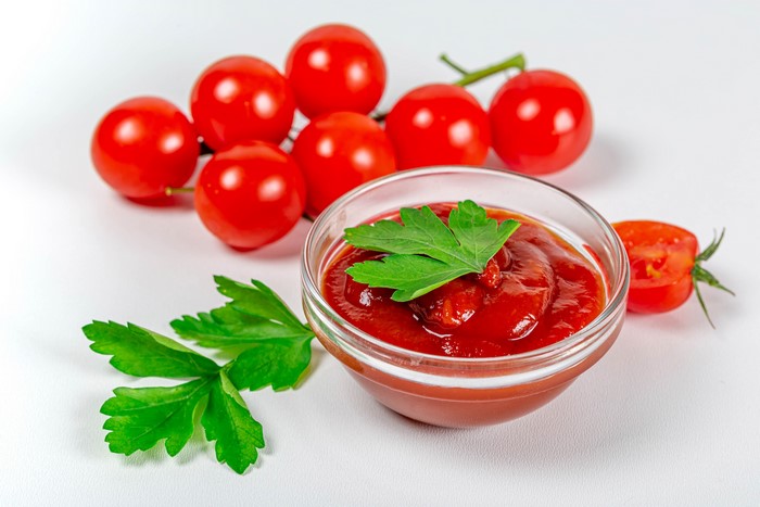 Tomatoes and Ketchup in a Bowl with Parsley