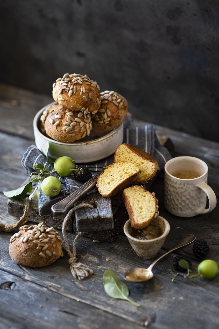 Buns with sunflower seeds, apples, blackberries, and coffee