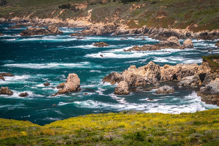 California Coastline with Rocky Outcrops and Waves