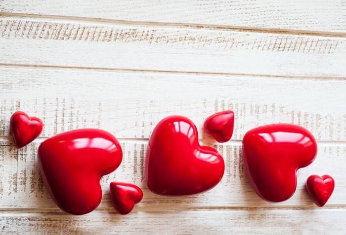 Red Hearts on White Wood Planks
