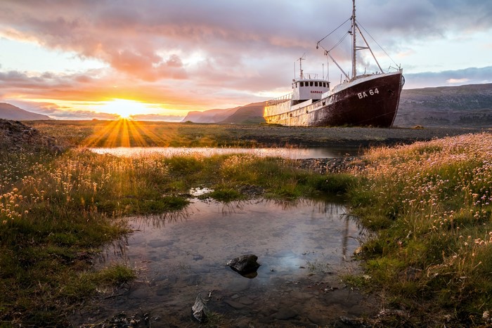 Shipwreck BA 64 at sunset with sun rays