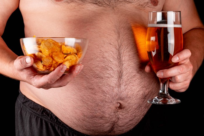Man with Beer and Chips
