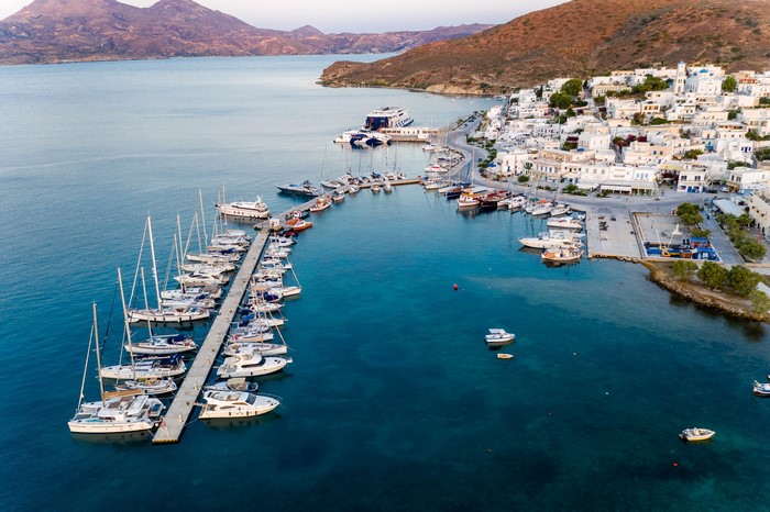 Adamas, Milos, Greece: Aerial View of a Harbor with Boats and Town