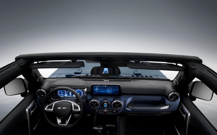 Interior of a Beijing BJ40C SUV with steering wheel and dashboard