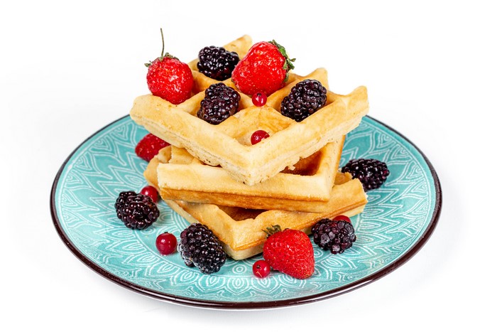 Waffles with Strawberries and Blackberries on a Plate