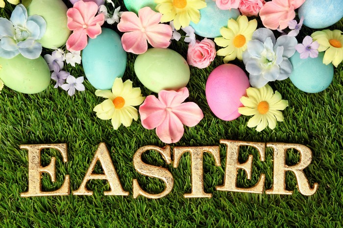 Easter Eggs and Flowers on Grass