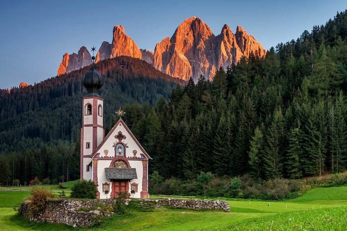 St. Johann in Ranui Church with Dolomites Mountains, Italy