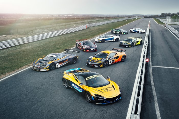 Many McLaren cars on a race track