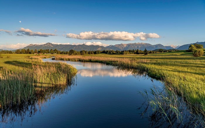 River Ach in Bavaria, Germany with Mountains