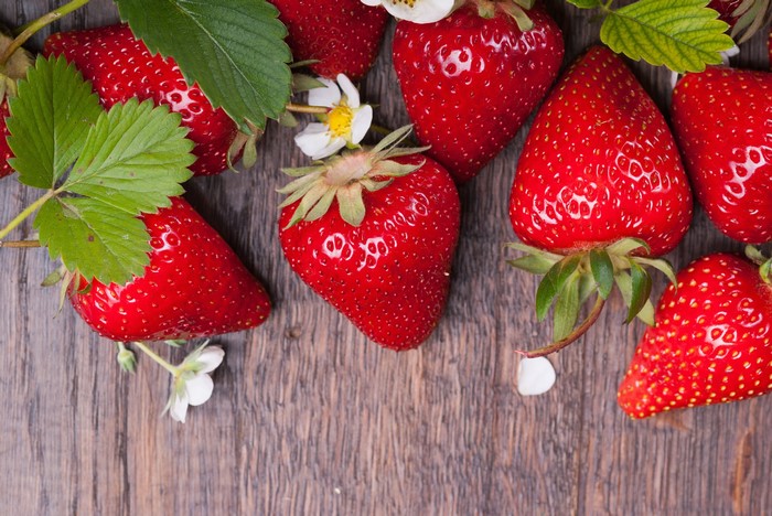4K Strawberries with Leaves and Flowers