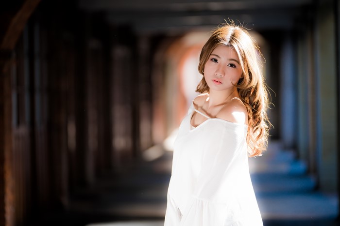 4K Asian Woman with Brown Hair and Bokeh