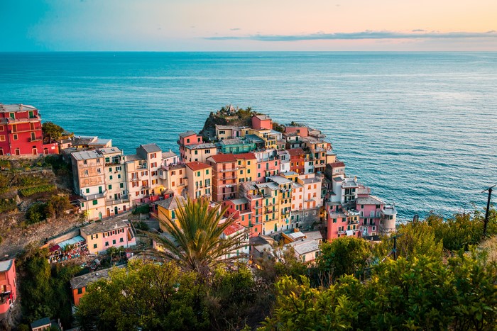 Colorful houses on a cliff overlooking the sea in Italy