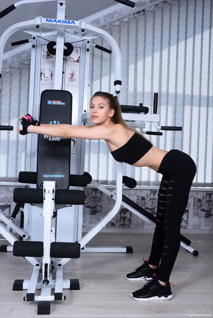 Avery 1997 poses at the gym