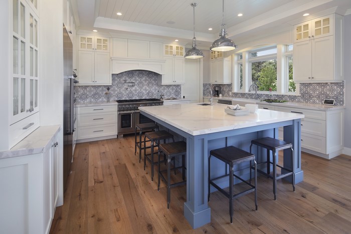 Kitchen with island and pendant lamps