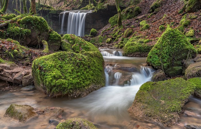Waterfall and stream in Butzerbach valley, Germany