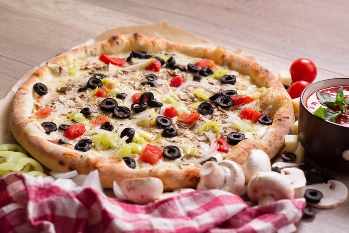 Pizza with Mushrooms, Olives, and Tomatoes