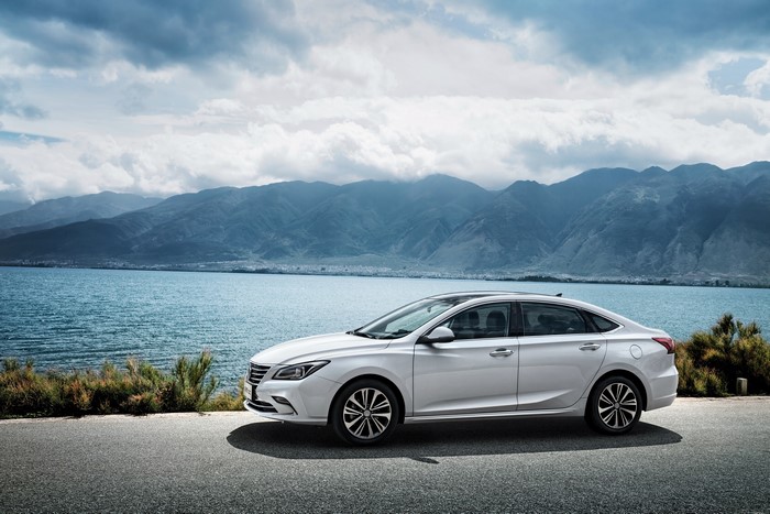 White Changan Sedan by a Lake
