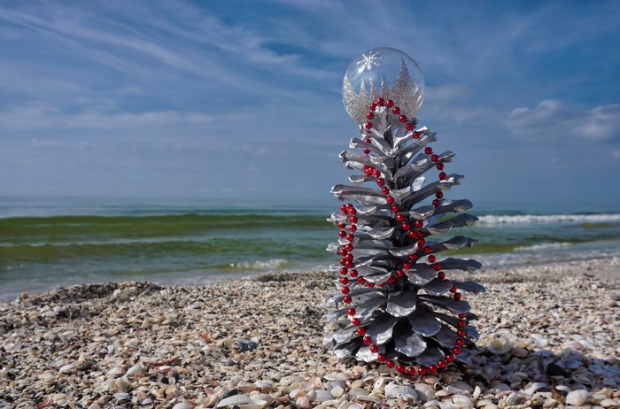 Christmas pine cone tree on a beach