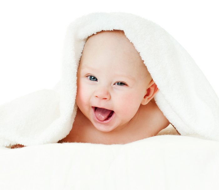 Baby wrapped in a white towel