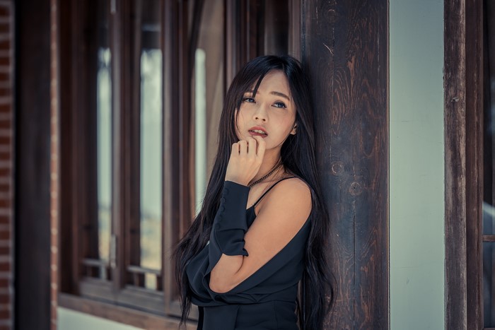 4K Portrait of Brunette Asian Woman Glancing