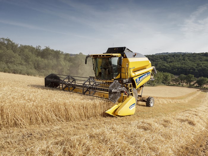New Holland TC5.90 Hillside Combine Harvester in Field