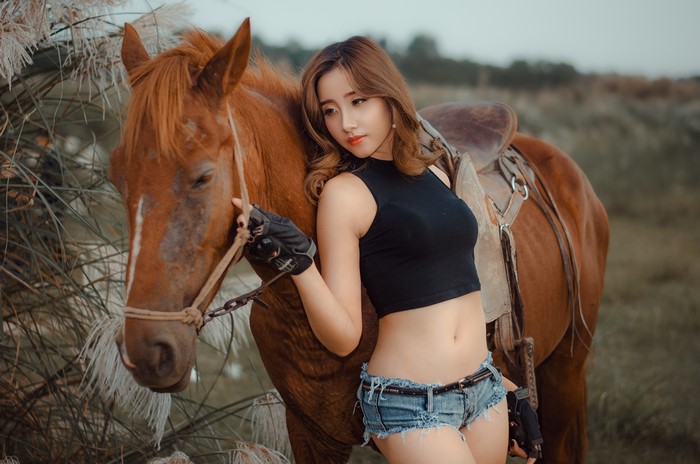 4K Elegant Asian Woman with Horse in Nature