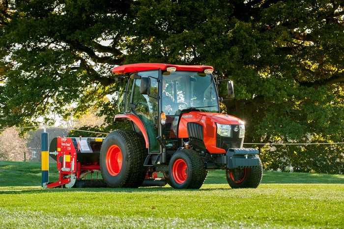 Kubota L2602 Tractor with Aerator Attachment