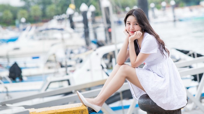 4K Asian Woman Sitting in White Dress