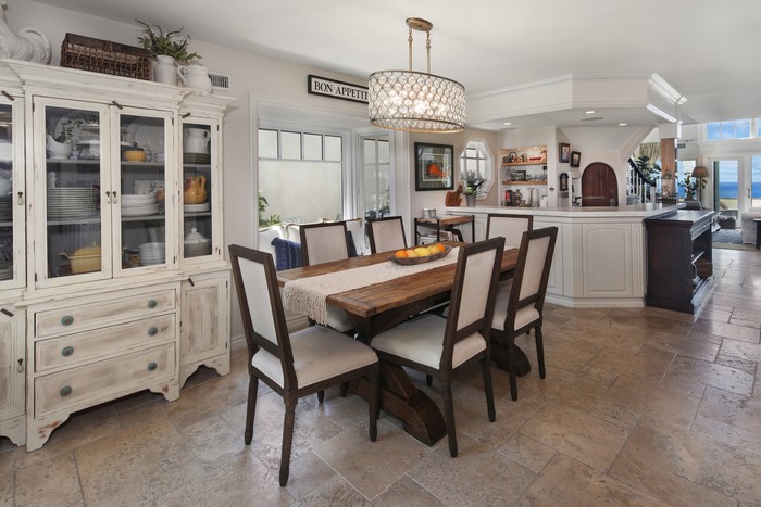 Dining room with table, chairs, and hutch