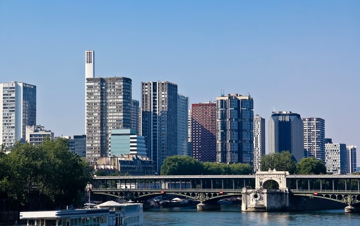 Paris skyline with bridge and river