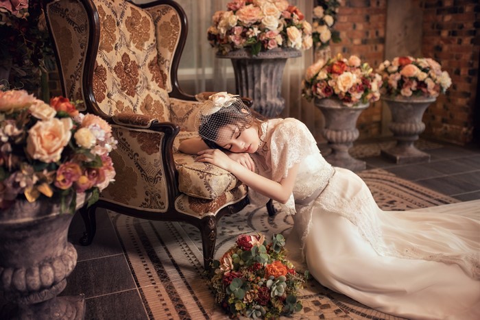 4K Asian Bride Lying by Floral Armchair
