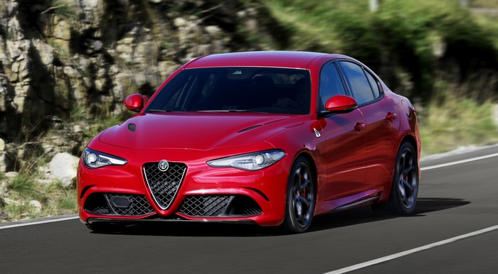 Red Alfa Romeo Giulia Quadrifoglio Sedan in Motion