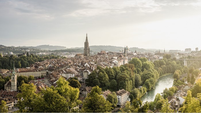 Bern, Switzerland cityscape with Aare river and church towers